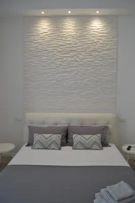 Letto o letti in una camera di Diamond House