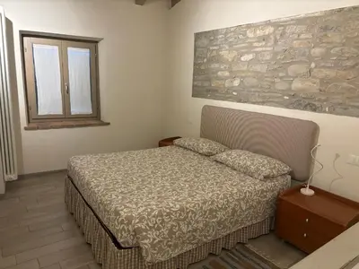 Letto o letti in una camera di UvaMatta
