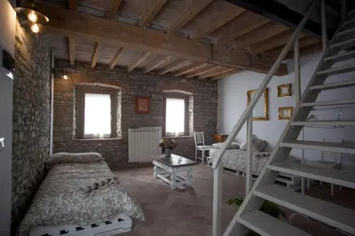 Letto o letti in una camera di UvaMatta