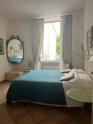 Letto o letti in una camera di La Dolce Vita