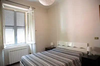Letto o letti in una camera di Casa della Posta