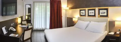 Letto o letti in una camera di Best Western Plus Hotel Modena Resort