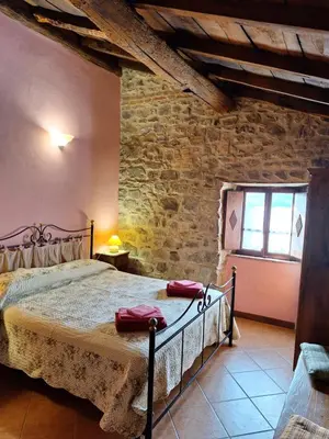 Letto o letti in una camera di Agriturismo Ristoro del Cavaliere