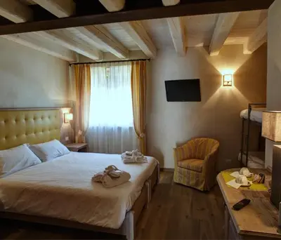 Letto o letti in una camera di Agriturismo Costa di Faraggiana