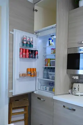 Cucina o angolo cottura di intero appartamento con giardino e colazione Dario