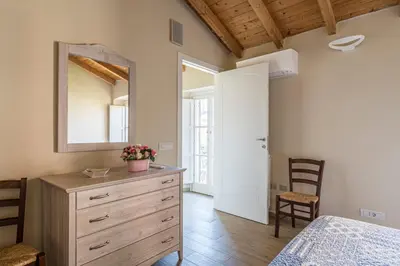 Letto o letti in una camera di I Delfini