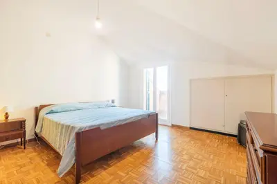 Letto o letti in una camera di Attico spazioso e con Vista, Levanto