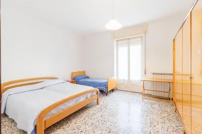 Letto o letti in una camera di A casa di Mauro, Levanto