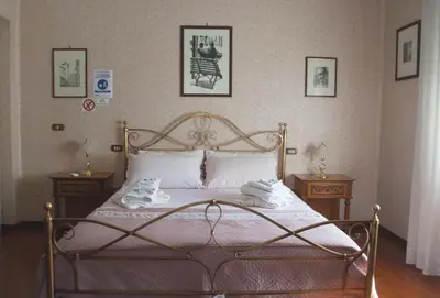 Letto o letti in una camera di La Casa di Tino