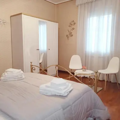Letto o letti in una camera di La Casa di Tino