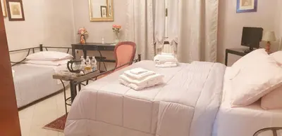 Letto o letti in una camera di La Casa di Tino