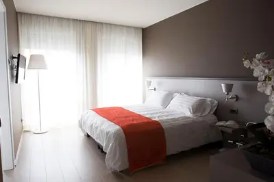 Letto o letti in una camera di Zara Rooms & Suites