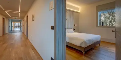 Letto o letti in una camera di Park Hotel & Residence by The Cube