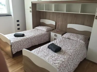 Letto o letti in una camera di VILLA DEGLI ULIVI