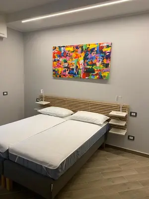 Letto o letti in una camera di Jacky House 1.0
