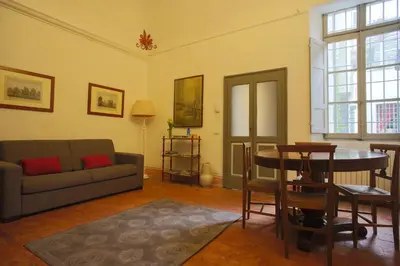 Area soggiorno di Two rooms apartment in Palazzo Malaspina