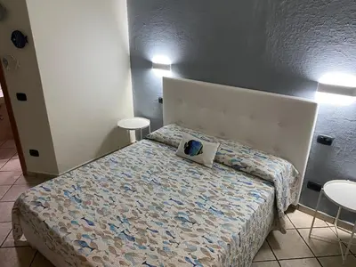 Letto o letti in una camera di B&B ALDA