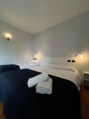Letto o letti in una camera di Master Hotel Reggio Emilia