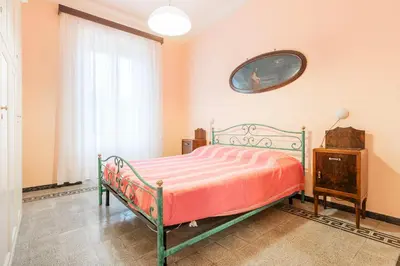 Letto o letti in una camera di La mia casa sul mare, Levanto