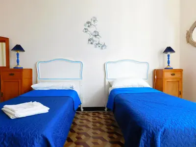 Letto o letti in una camera di Appartamento signorile in villa!