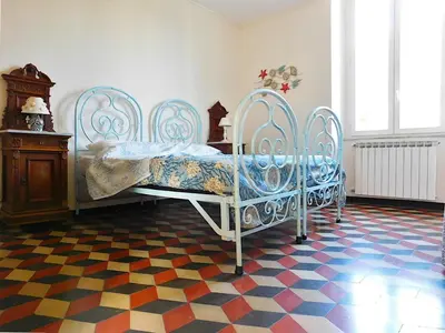 Letto o letti in una camera di Appartamento signorile in villa!