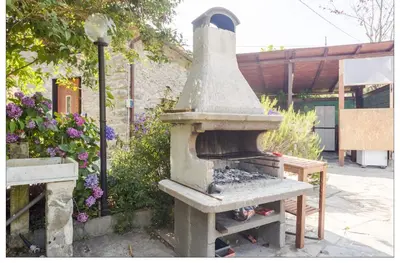 Attrezzature per barbecue disponibili per gli ospiti della casa vacanze