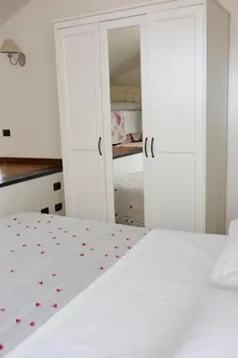 Letto o letti in una camera di Casa Vacanze Tra Le Mura
