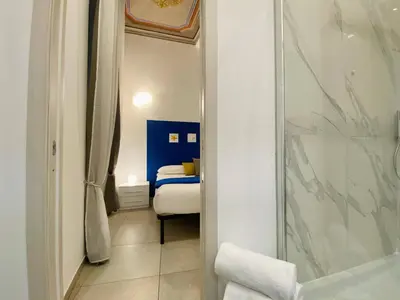 Letto o letti in una camera di Casa Rosa al Mare, Rapallo