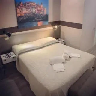 Letto o letti in una camera di Albergo La Villetta