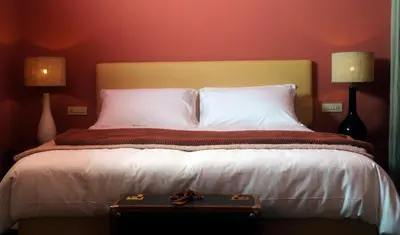 Letto o letti in una camera di Ermellina