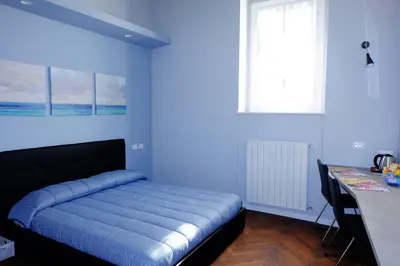 Letto o letti in una camera di MONOLOCALE VICINO MILANO 2