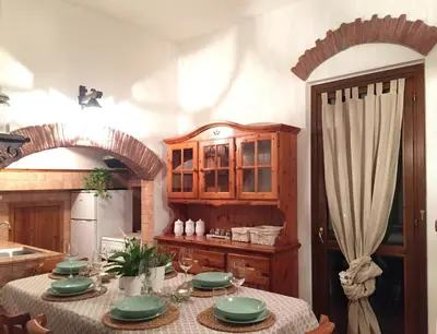 Cucina o angolo cottura di CASA VACANZE MONEGLIA 2 CAMERE con TERRAZZA nel VERDE