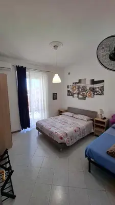 Letto o letti in una camera di Buonviaggio