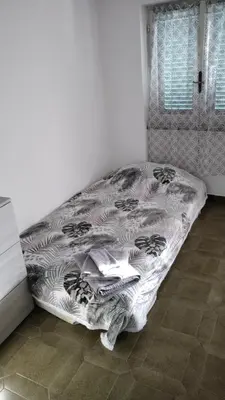 Letto o letti in una camera di La casa di Andrea