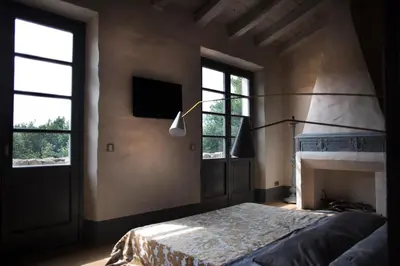 Letto o letti in una camera di B&B La Fustaia