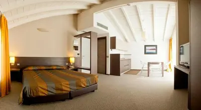 Letto o letti in una camera di Locanda Sant'Ambrogio