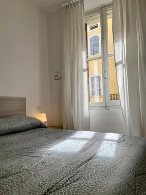 Letto o letti in una camera di Appartamento Strada Duomo