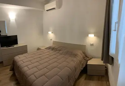 Letto o letti in una camera di Ca du Sergio - Le Mura
