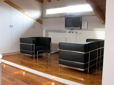 TV o dispositivi per l'intrattenimento presso Parizzi Suites&Studio Restaurant