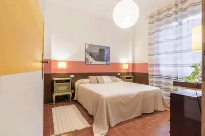 Letto o letti in una camera di Il nido del pavone