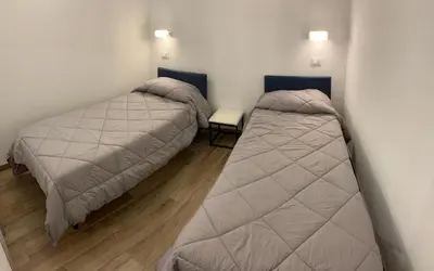 Letto o letti in una camera di Ca du Sergio - Il Mesco
