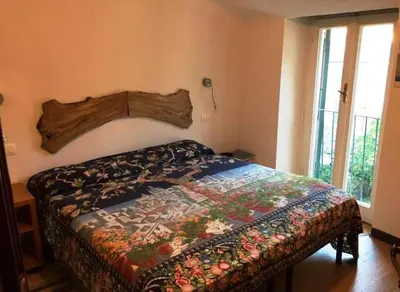 Letto o letti in una camera di Al Castello