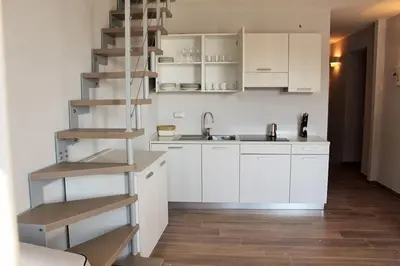 Cucina o angolo cottura di Residenza del Capitano Luxury Apartments