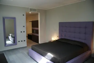 Letto o letti in una camera di Blue Hotel