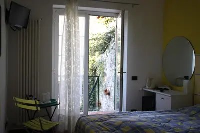 Letto o letti in una camera di Villa Clelia