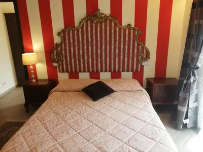Letto o letti in una camera di B&B Al Calcandola