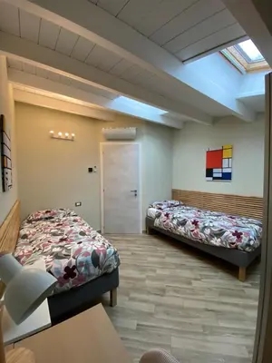 Letto o letti in una camera di Jacky House 3.0