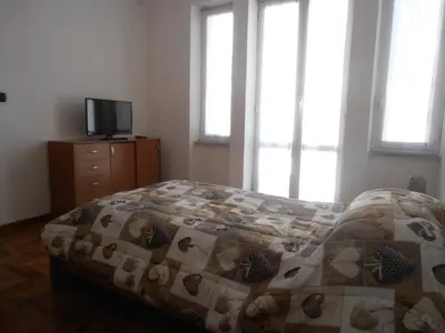 Letto o letti in una camera di Appartamento tra mare e montagna
