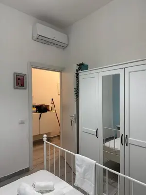 Letto o letti in una camera di Le Tre Borghesi