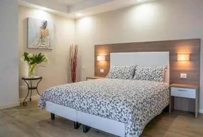 Letto o letti in una camera di RED ONE